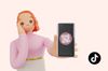an illustration of a woman showing a phone with a QR code and a TikTok logo