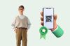 an illustration of a man smiling a phone displaying a QR code and a warrantybadge